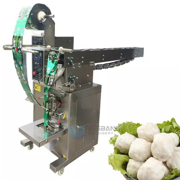 工厂卷膜袋装云吞饺子分装机速冻食品包装机半自动链斗定量包装机图片