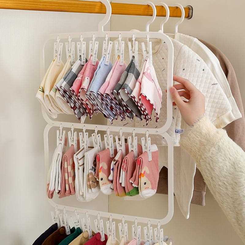 直销新款宝宝衣柜收纳神器婴儿衣架儿童帽子口水巾袜子挂钩免打孔