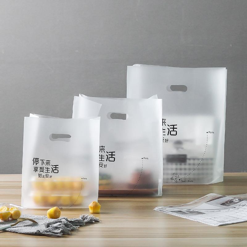 直销新款塑料袋手提袋简约网红蛋糕盒子便当通用服饰袋子烘焙一次