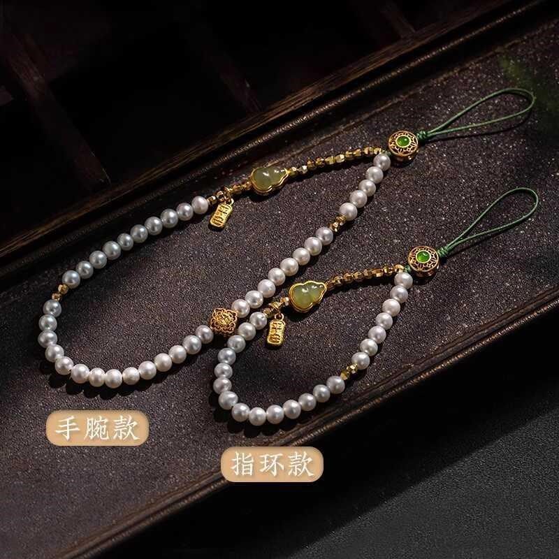 天然珍珠手机链挂件手腕挂绳小清新绿色高级文艺温婉女手机挂饰礼