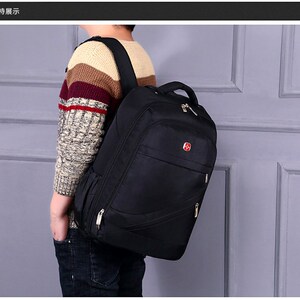 新款单拉杆双肩背包商务男士电脑包大容量牛津布旅行箱包18 20寸