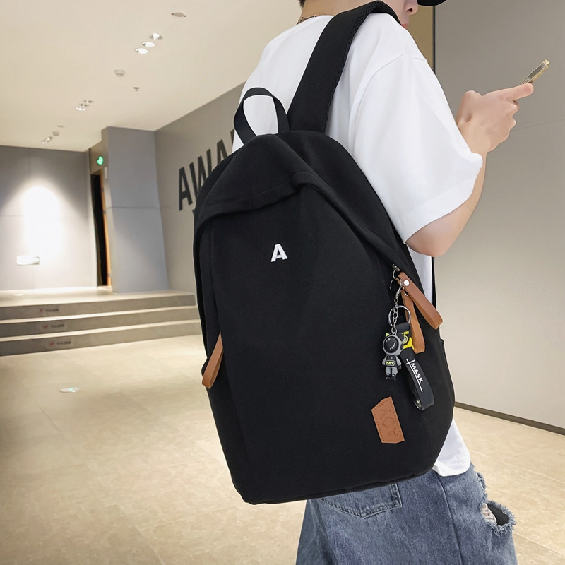 书包女大学生电脑包休闲大容量轻便旅行背包简约日系帆布双肩包男