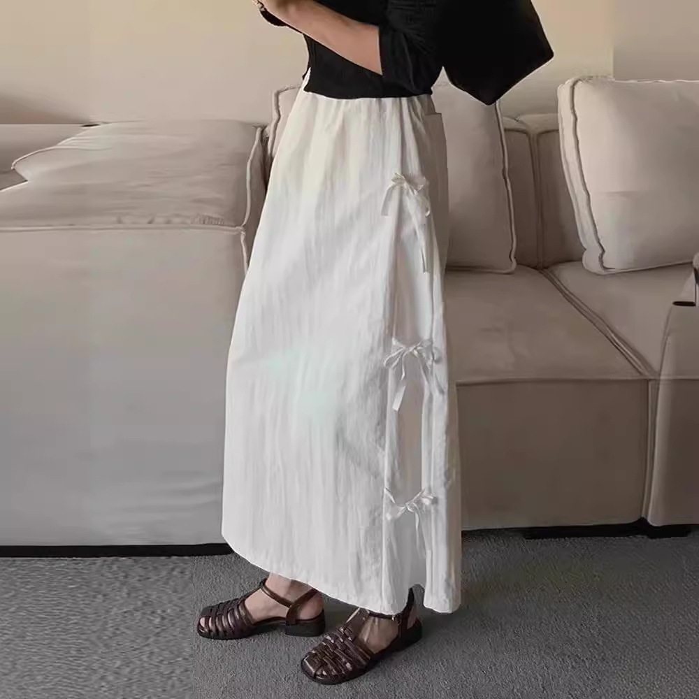 白色蝴蝶结系带半身裙女新款夏季a字垂坠感气质显瘦休闲长裙