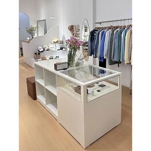 服装店岛桌展示台彩绘玻璃展示柜定制女装店岛桌装饰岛柜