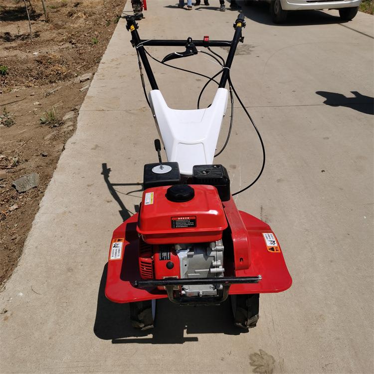 新款四驱旋耕机手扶山地耕地机汽油小型微耕机