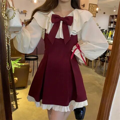 有腰带公主风新年连衣裙女2024春秋新款小众设计感蝴蝶结吊带短裙