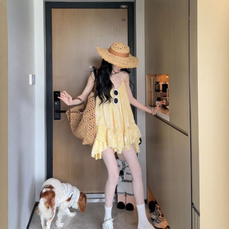 多巴胺黄色挂颈吊带洋装子2026夏季绝美海边度假风蓬蓬裙娃娃裙