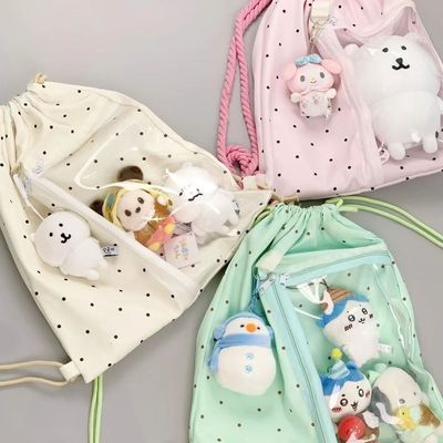 薄巧星波点抽绳痛包双肩娃包女大容量谷物养上课通勤帆背包包