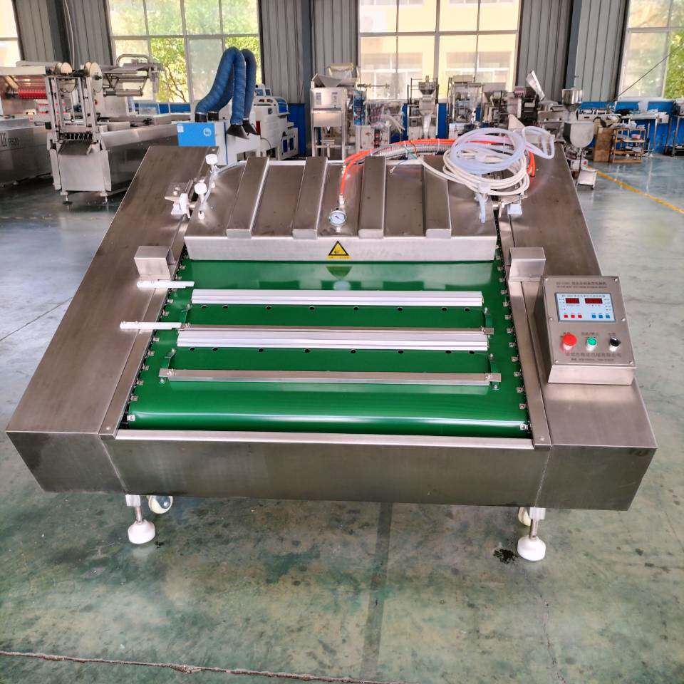东北红肠连续式真空封口机1000型滚动式真空封口机价格送货