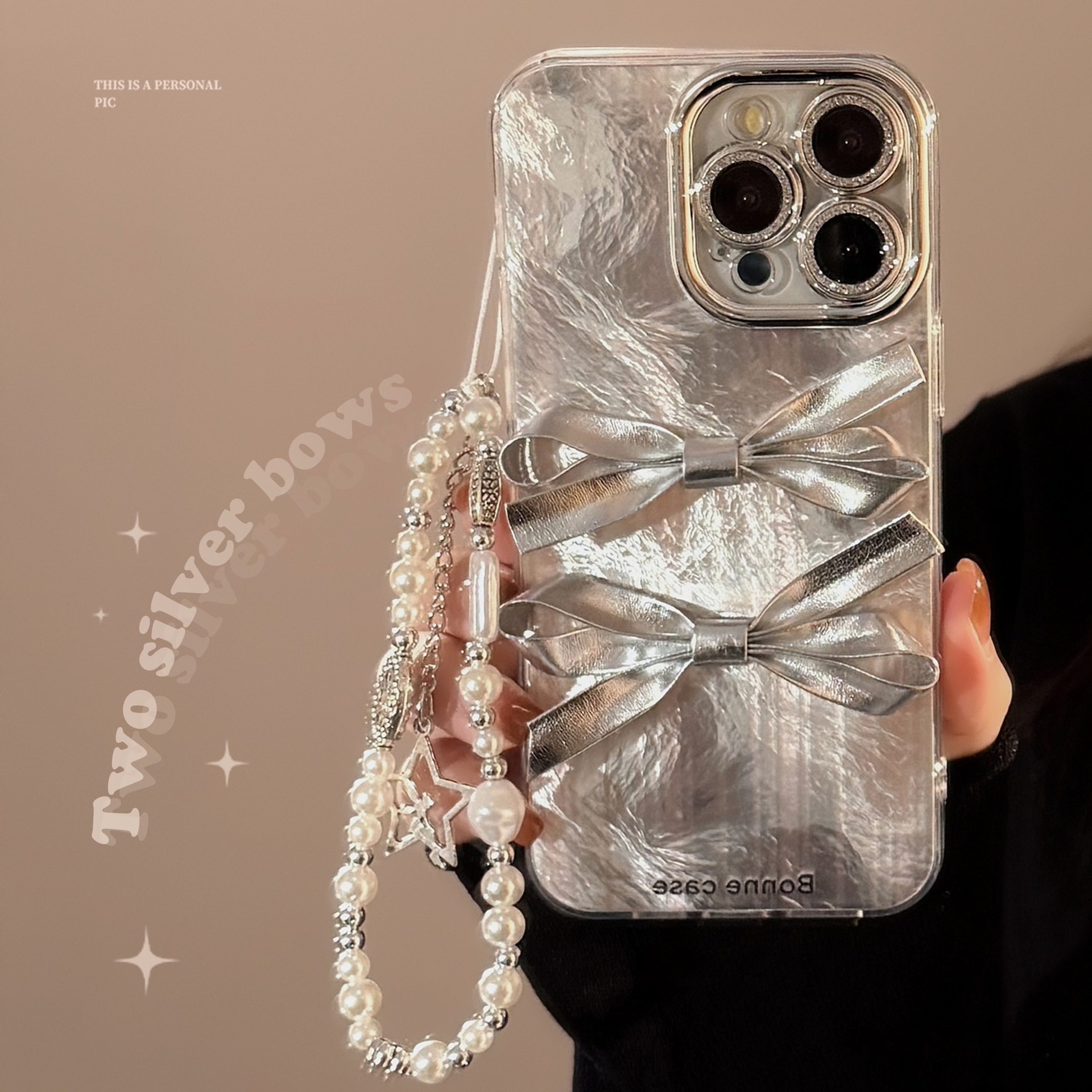 立体银色蝴蝶结手机壳适用16苹果15promax轻奢iphone14挂链13全包