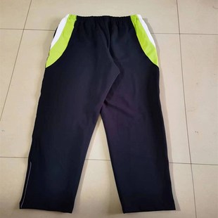 定做中小学生新款深蓝色拼接宽白杠加荧光绿杠宽松直筒校服长裤子