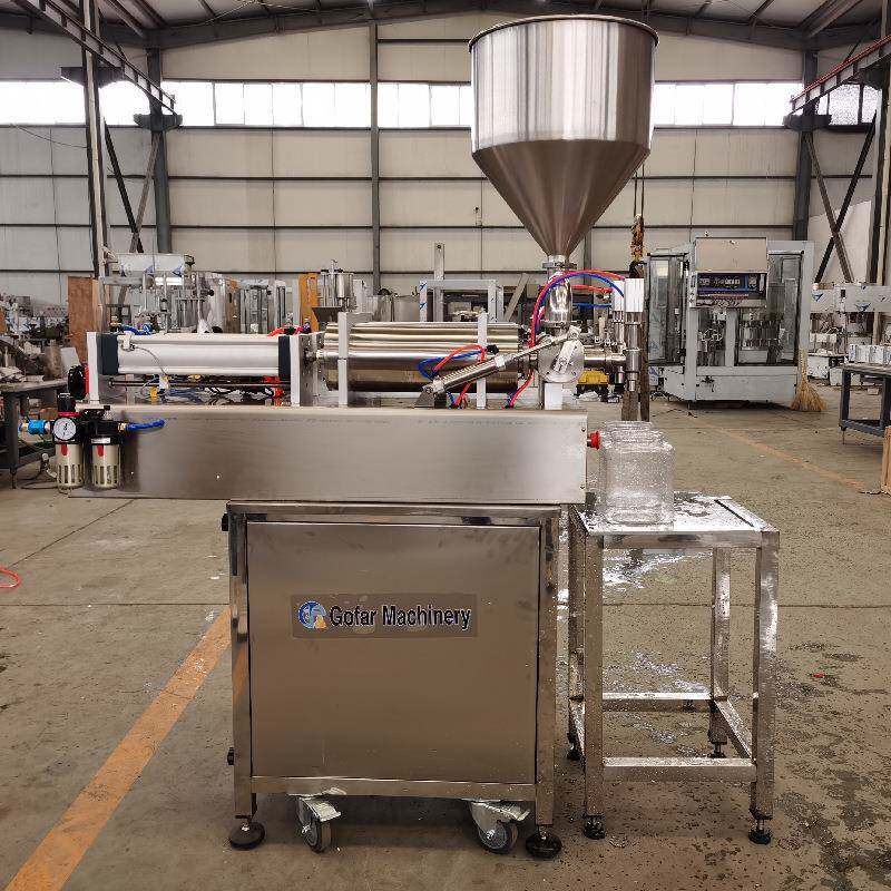 半自动活塞灌装机卧 可搅拌气动豆瓣椒牛肉式辣酱灌装机