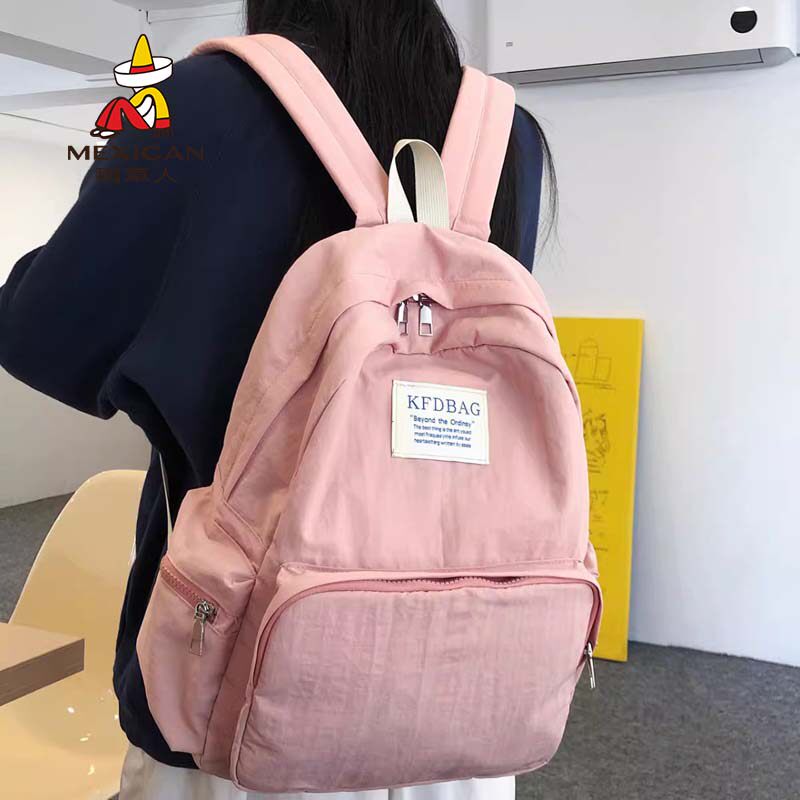 稻草人简约纯色双肩包原宿风大容背包初高中大学生轻便百搭书包