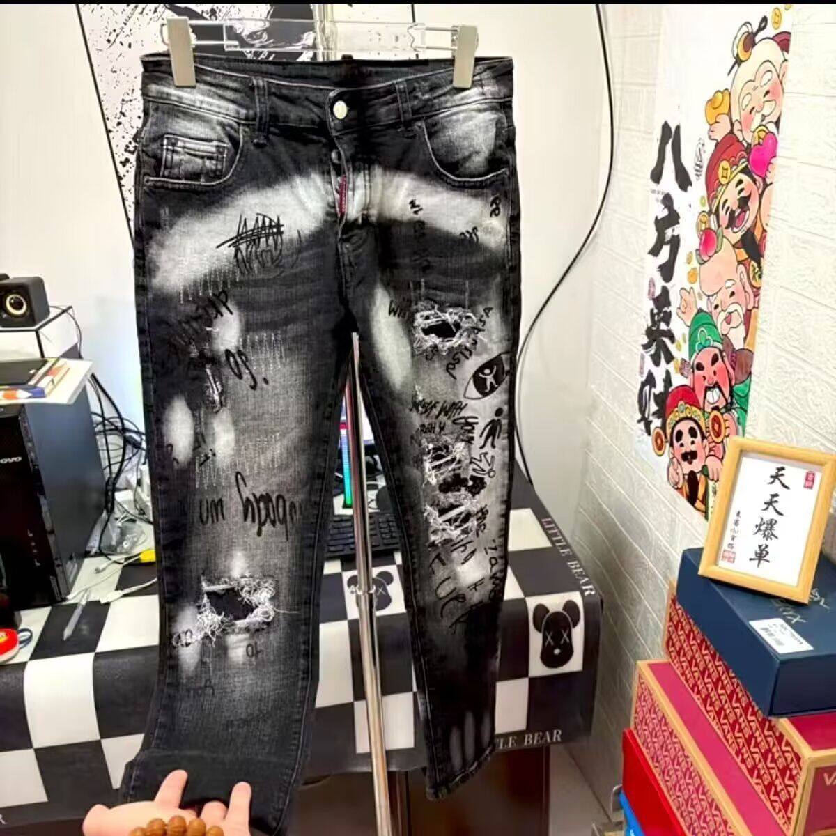 轻奢D2高版本牛仔裤男泼墨紧身修身印花潮牌涂鸦假破洞弹力补丁