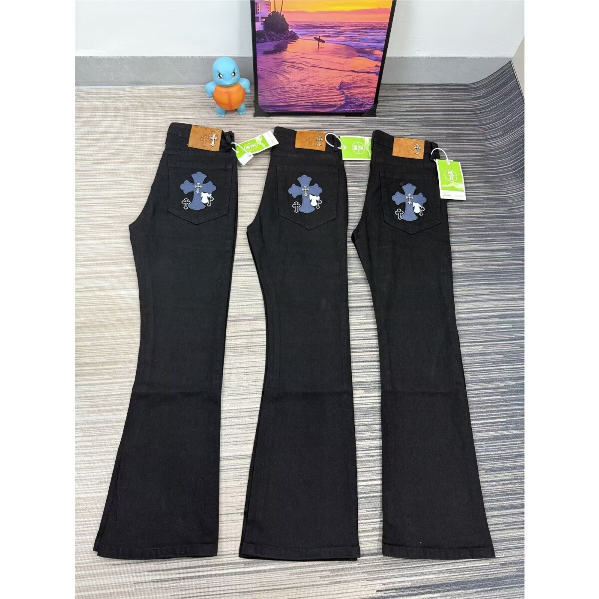新款潮牌口袋十字架贴皮微喇牛仔裤轻奢时尚高级男女修身显瘦长裤