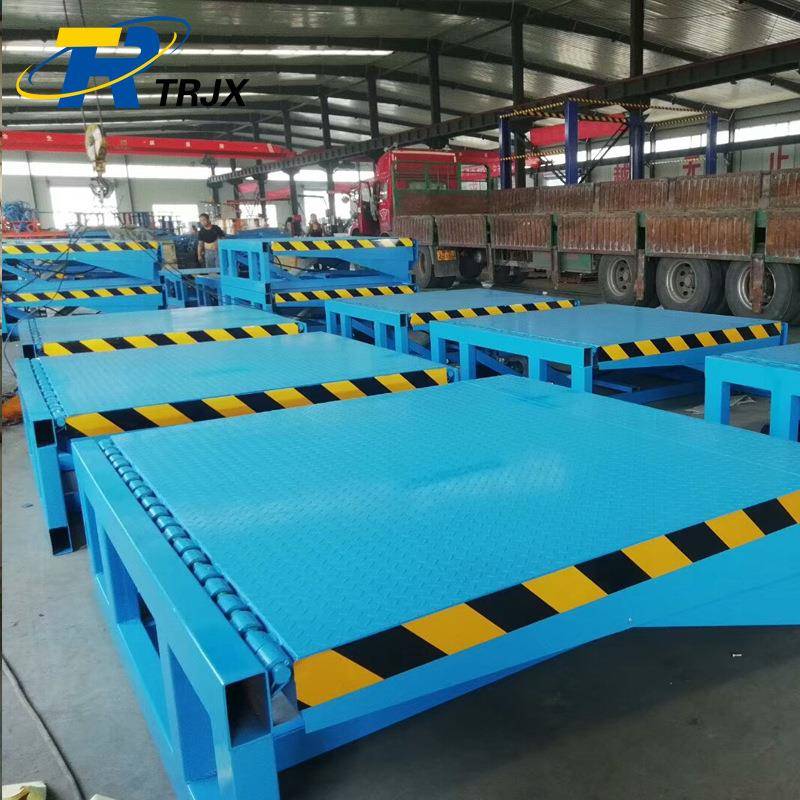 供应集装仓储物流电动高度调节锰钢液压固定式装卸货平台登车桥