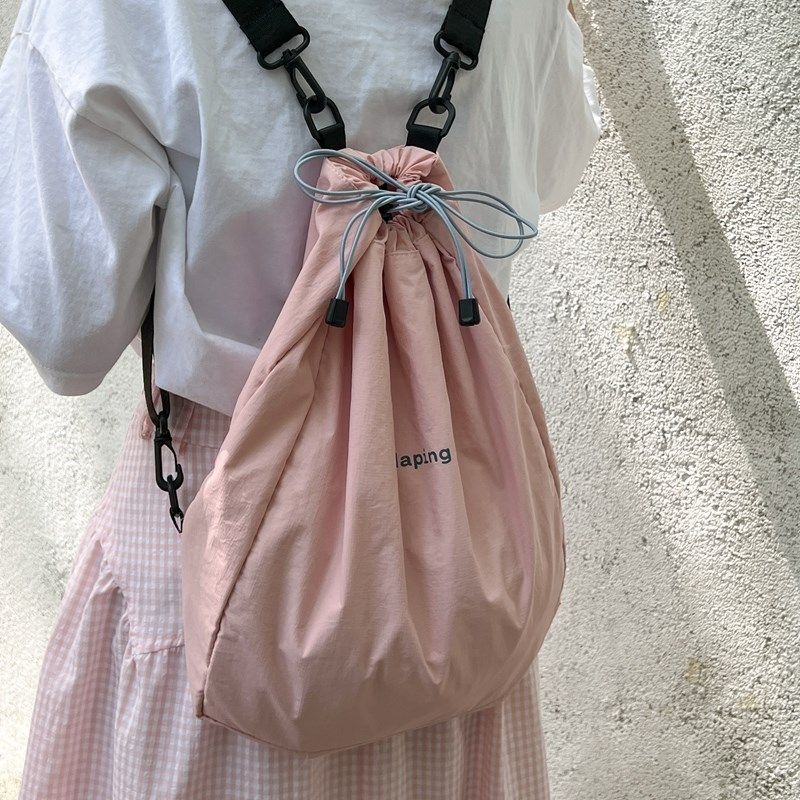 2024新款户外速干拼色抽绳双肩包女通勤休闲束口轻便透气旅行包,箱包皮具/热销女包/男包,双肩背包,淘宝优惠券,粉丝福利购,淘宝优惠卷