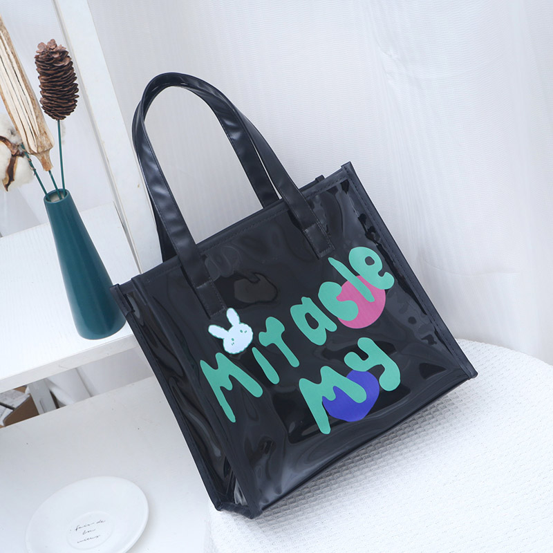 时尚休闲手提袋黑色PVC手提包