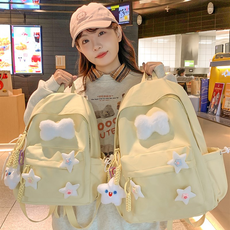 书包小学生女生初中生高颜值纯色高中学生大学生定制双肩背包