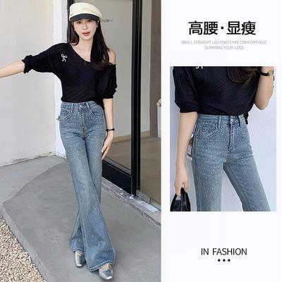 浅蓝色亮钻微喇牛仔裤女
