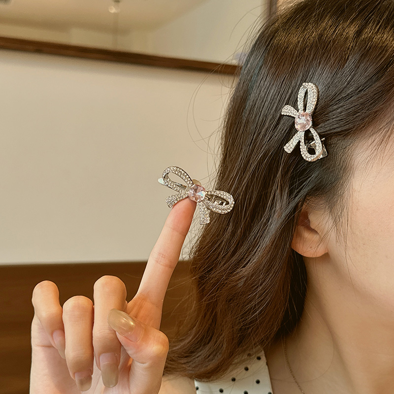 蜜桃茶侧边粉钻蝴蝶结发夹