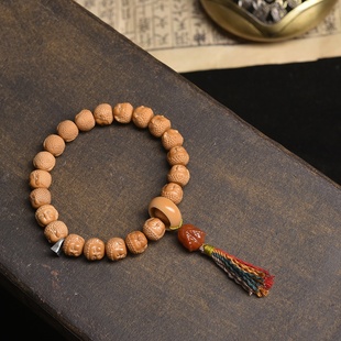 精品光珠猴头宝宝佛原籽原皮水晶凤羽核桃佛珠手串男款生日礼物