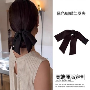 气质低丸子头黑色缎面蝴蝶结弹簧夹头饰2025新款后脑勺马尾发夹女