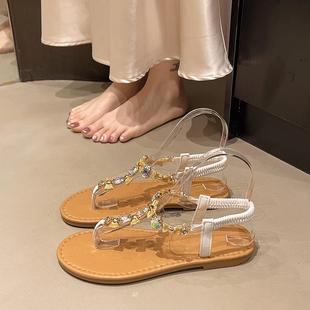 2025新款 配裙子仙女風水鉆平底夾趾度假海邊沙 女夏季 品牌羅馬涼鞋