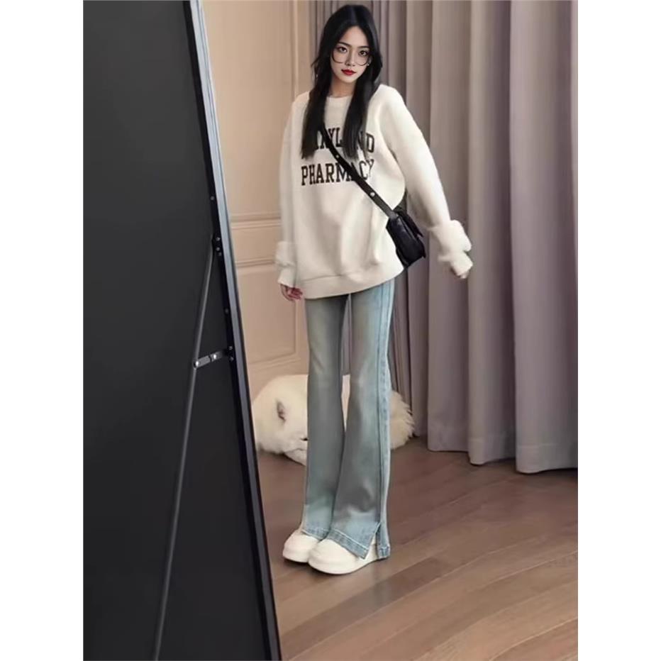 开叉牛仔裤微喇女弹力修