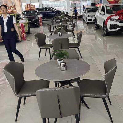 2025新款桌洽谈椅组合灰岩板圆桌阳一色桌四椅轻奢商务接待谈判桌