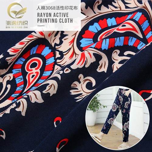 绵绸面料 夏季3068人造棉腰果花印花布 男装裤装套装面料厂家