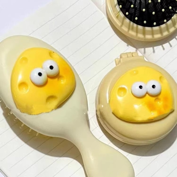 卡通奶酪气囊梳子小巧便携式气垫按摩梳女可爱迷你可折叠一体镜梳