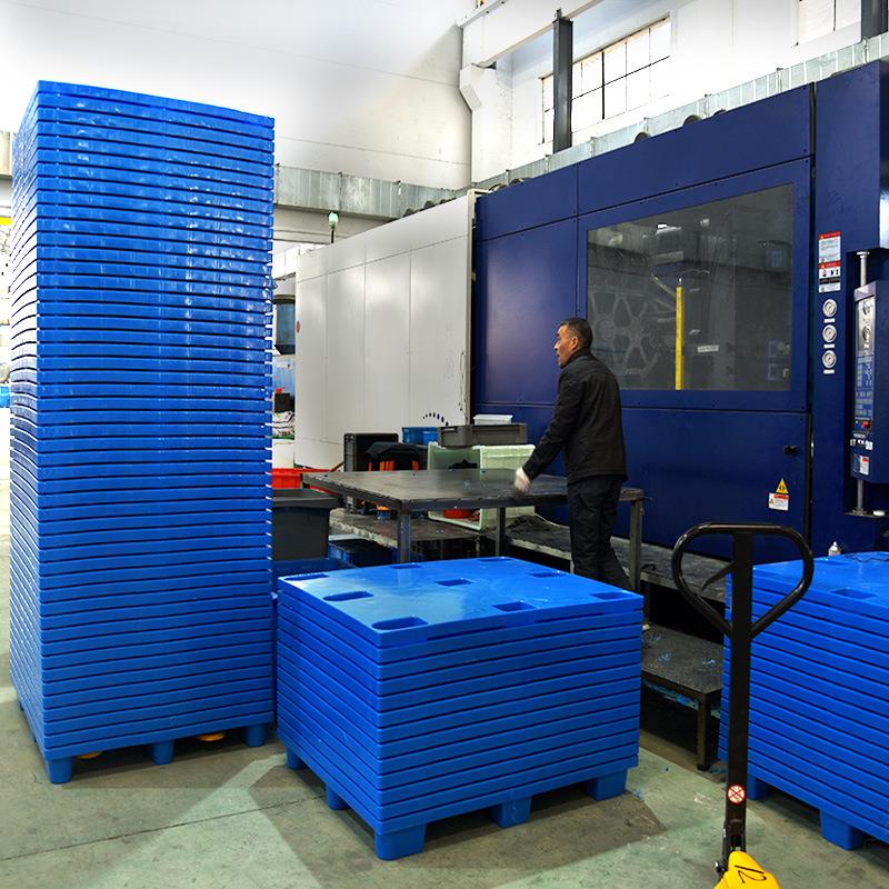 富立0QCL板卡121平九脚塑料托盘流用塑胶栈物板叉车地牛卡板厂家