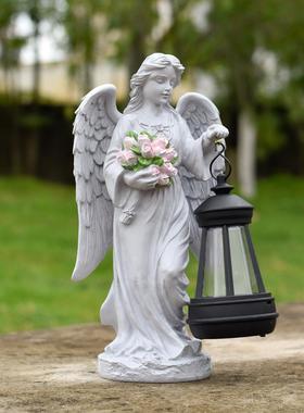 跨境抱花天使女孩户外太阳能花园装饰雕像庭院摆件夜灯树脂工艺品