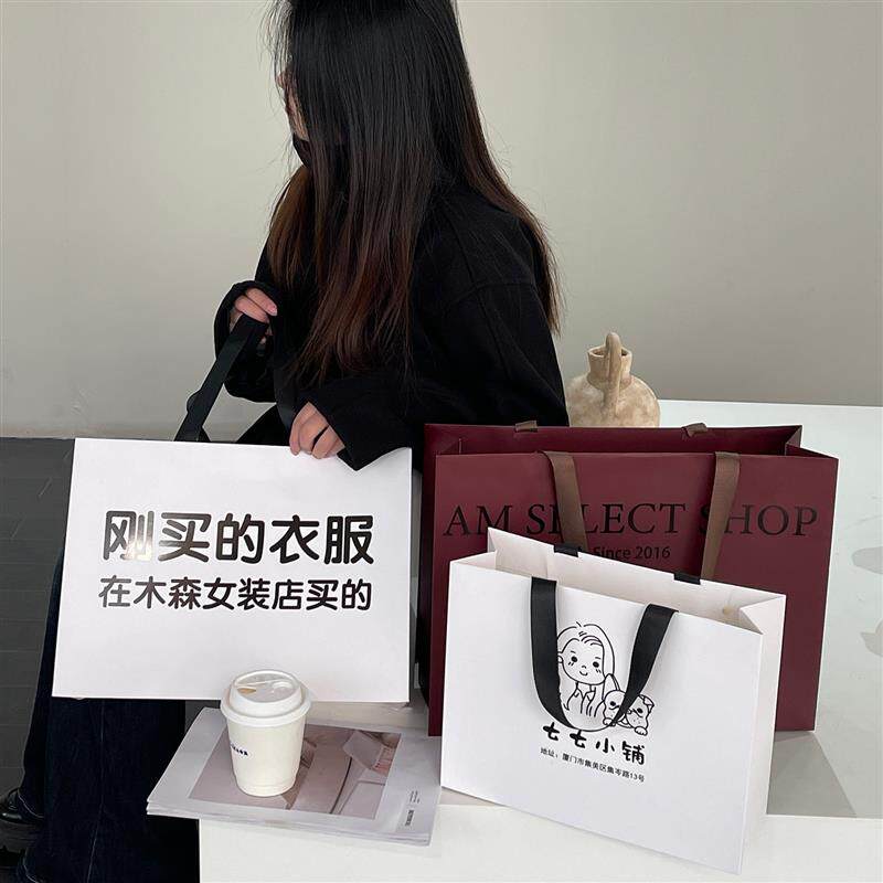 高级购物服装店纸袋UV彩印女装包装袋衣服美容院礼品手提袋子定制