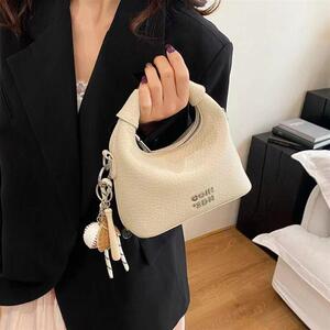 奈亚轻奢服饰2026夏季新款时尚百搭手拎包复古单肩斜跨高级感女包