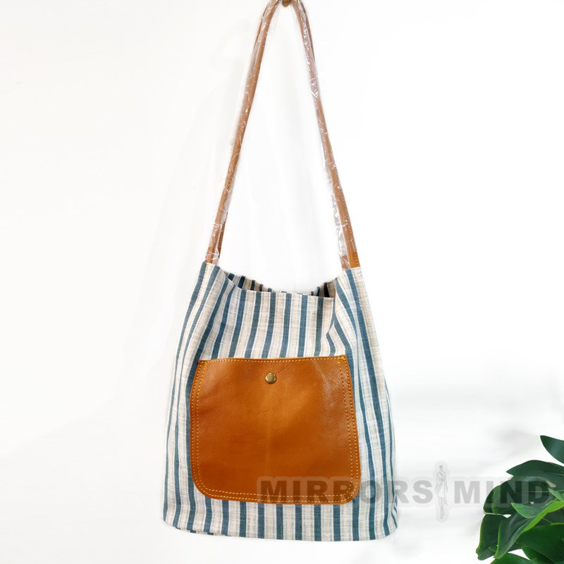 2024简约百搭轻便条纹帆布牛皮拼接气质水桶休闲复古文艺单肩女包