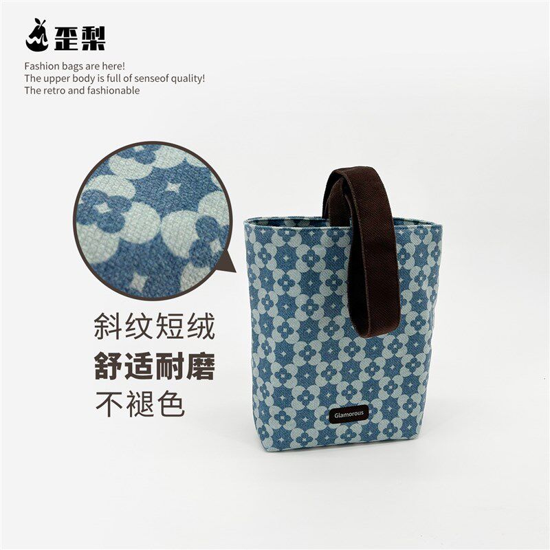 牛仔老花复古手拎遛m弯水桶包包小众环保高级通勤百搭帆布收纳袋