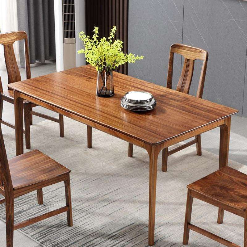 现代简约乌金木长方形餐台极简北欧原木色中小户型全实木餐桌家具