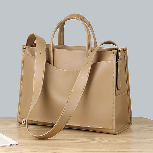 真皮宽肩带多隔层大容量包包