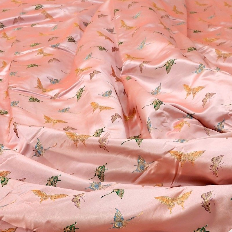 梅花蝴蝶布料diy丝绸绸缎汉服面料红色花图案Q真丝织锦缎被面缎子