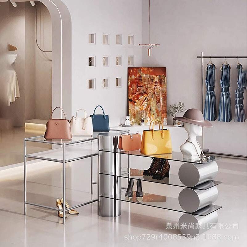 不锈钢柜服装店中岛桌中间摆放透明玻璃桌饰品展示流水台中岛展架