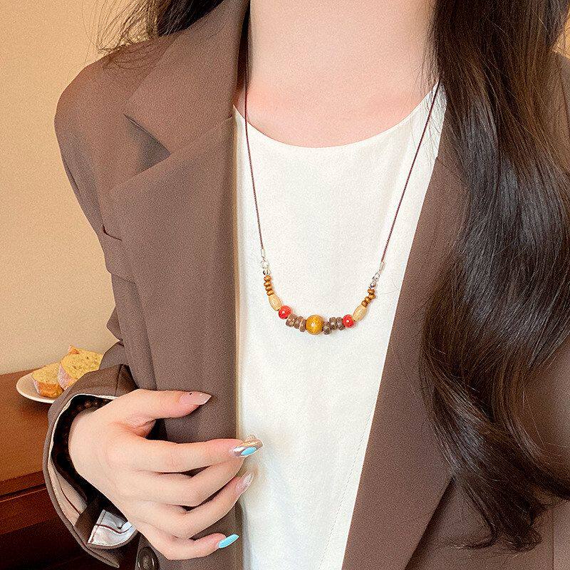 女小众串珠时尚配饰毛衣链设计感民族风吊坠木质长款复古项链百搭