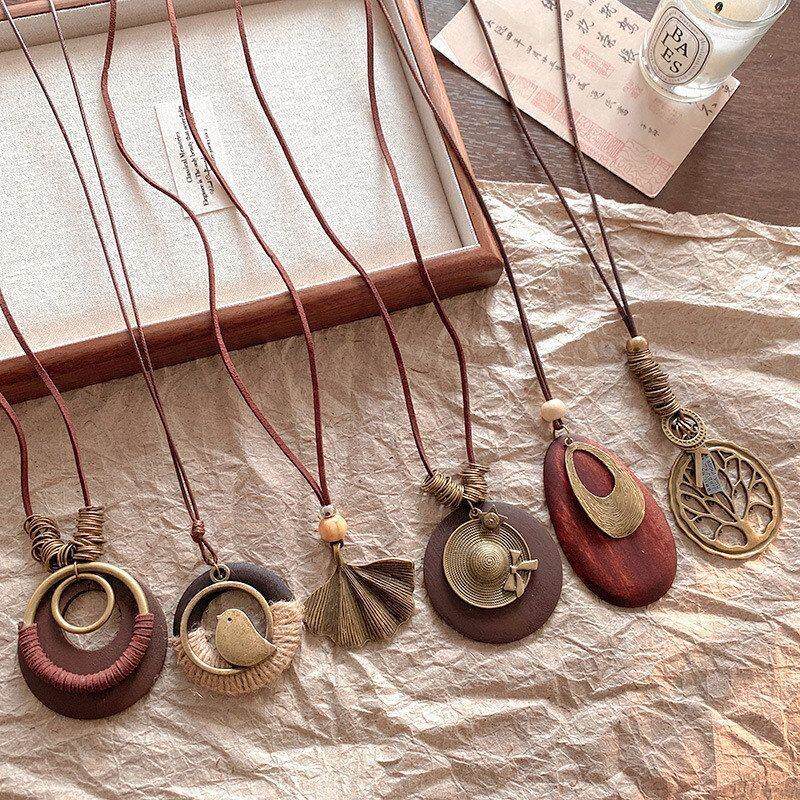 吊坠设计感树叶民族风复古锁骨帽子女圆形项链毛衣链链水滴形木头