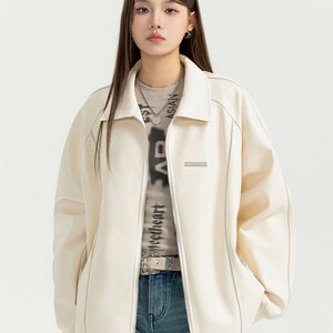Unizzle丨银标翻领皮衣外套zPU皮质休闲宽松夹克外套国潮男女情侣