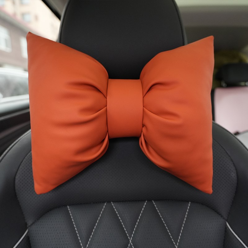理想橙汽车蝴蝶结头枕头女生车载可爱I枕车用橙色护颈枕舒适腰靠