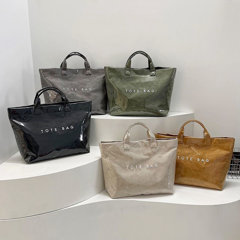 大容量杜邦纸果冻包时尚透明PVC防水手提袋上班通勤托特包妈咪包