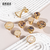 柜门拉手轻奢水晶北欧橱柜衣柜抽屉现代简约创意贝壳单孔黄铜把手