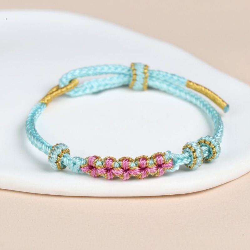 桃花结手链手工编织铃兰花手绳本命年可串珠半成品diy红绳男女