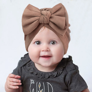 欧美秋冬新款德绒儿童柔软蝴蝶结帽 婴儿保暖纯色套头帽 帽子